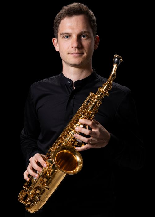 Jan GRIČAR, musicien ambassadeur JLV, avec son instrument équipé d'une ligature JLV