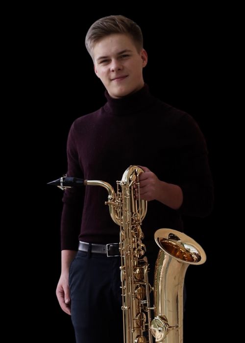 Kacper PUCZKO, musicien ambassadeur JLV, avec son instrument équipé d'une ligature JLV
