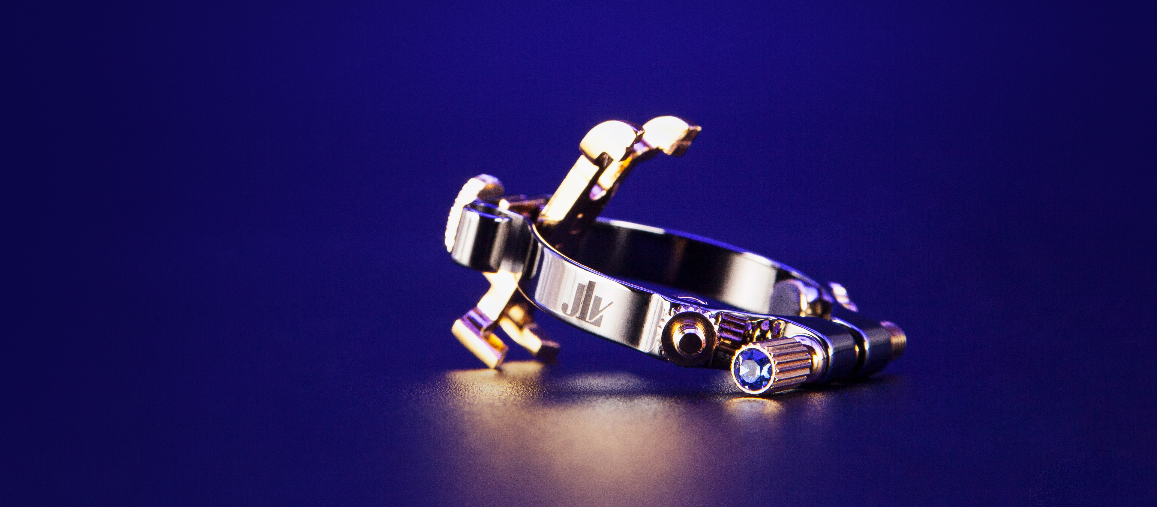 Ligature JLV plaquée platine & or pour saxophone et clarinette