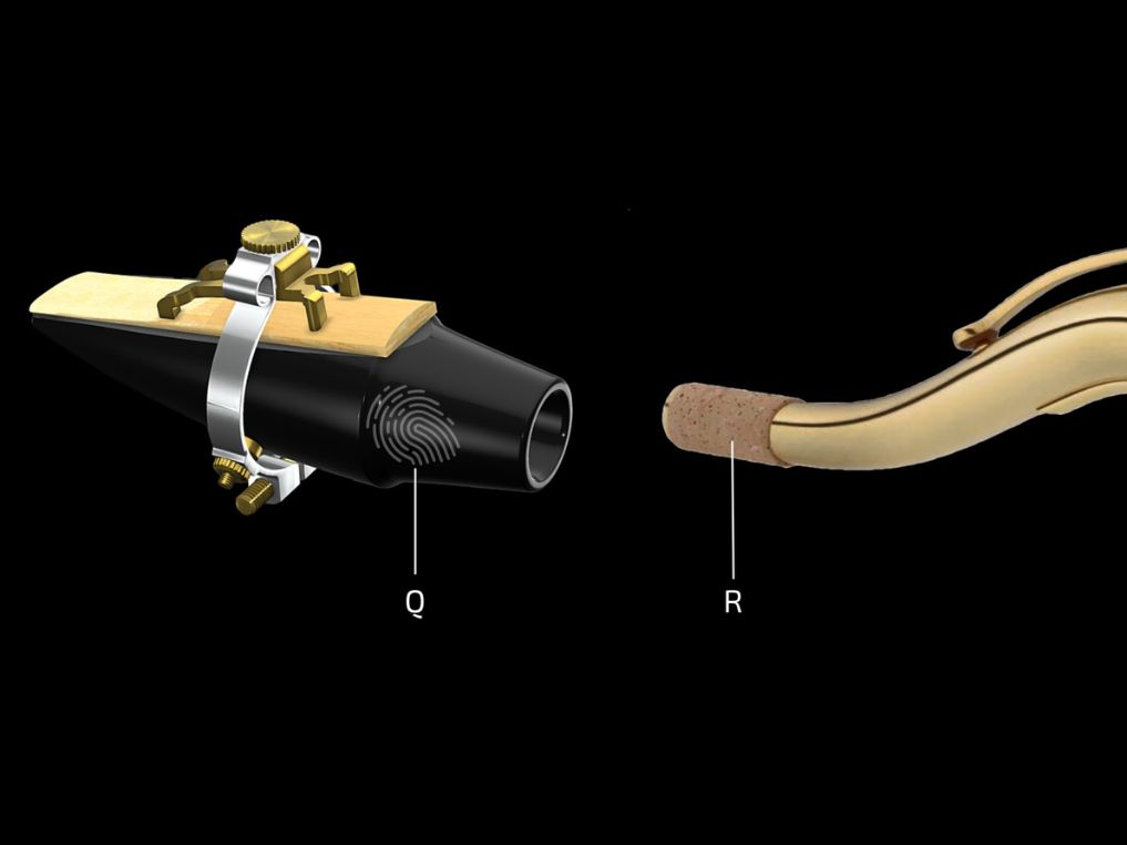Photo d'un embout buccal avec une ligature JLV illustrant son installation sur un col ou un barillet